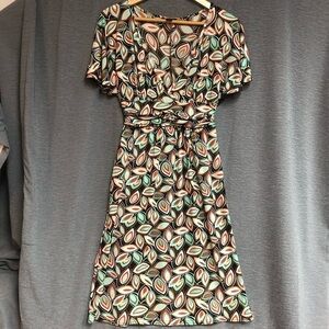 Intrigue, medium dress with flutter sleeves, a V-neck